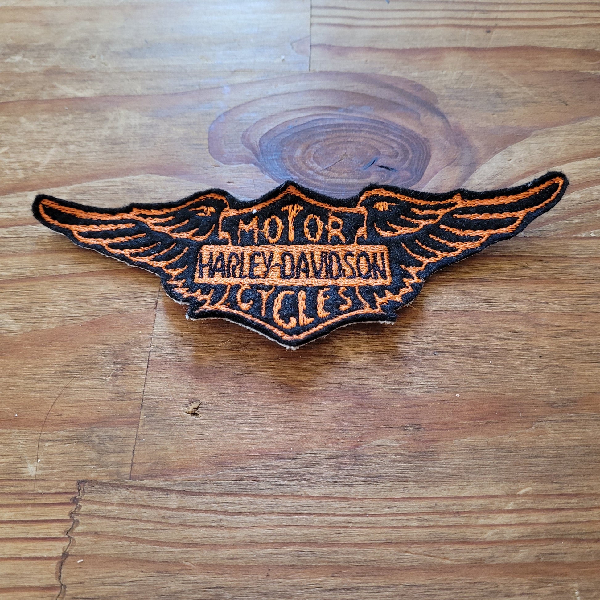 Vintage Harley Wing Logo ( Version Black & Orange) - L'Insoumis Clothing