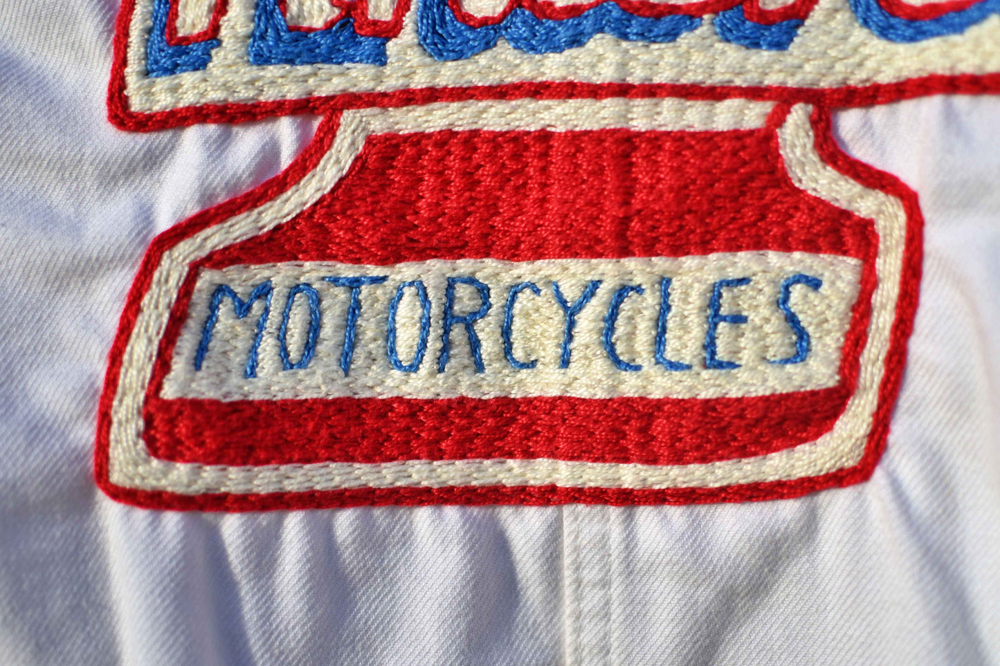 Jacket white workwear from the 50's Evel Knievel  hand embroidered chainstitch/veste ouvrière brodée main point de chaînette - L'Insoumis Clothing